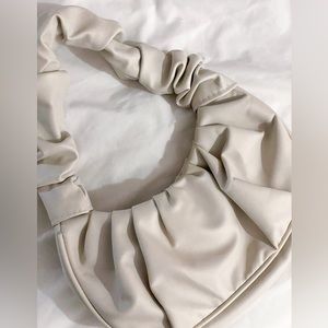 Cute scrunchy purse in cream color